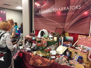 Romance Narrators' booth at the Bazaar featured a variety of items from over 20 audiobook narrators.